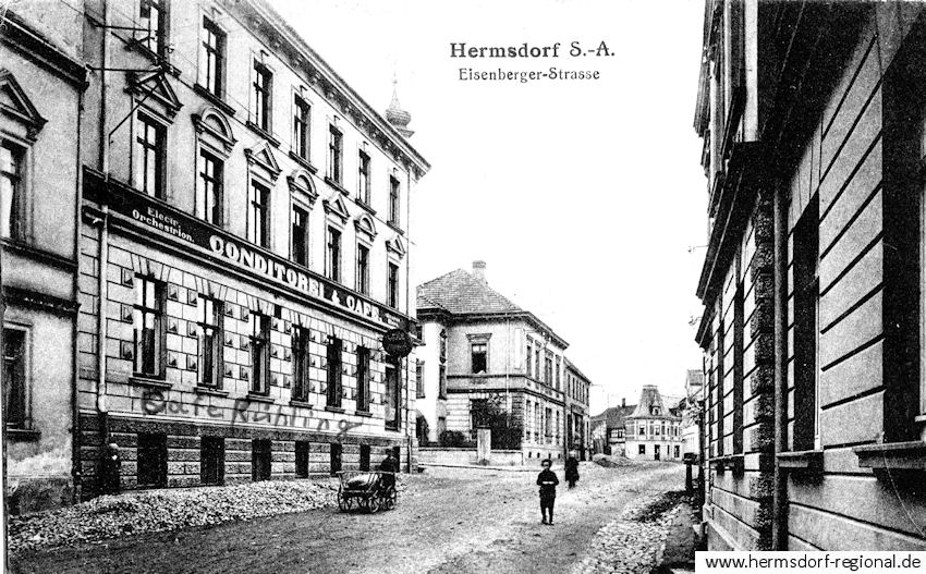 Blick in die Eisenberger Straße, mit dem Café Rühling und dem Haus Nr. 7 Bildmitte, um 1920